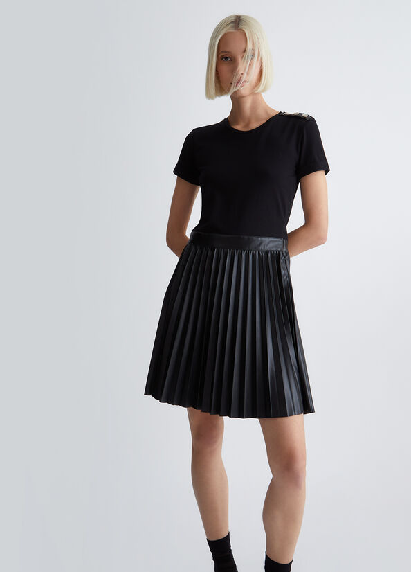 Vestito nero con gonna plissé