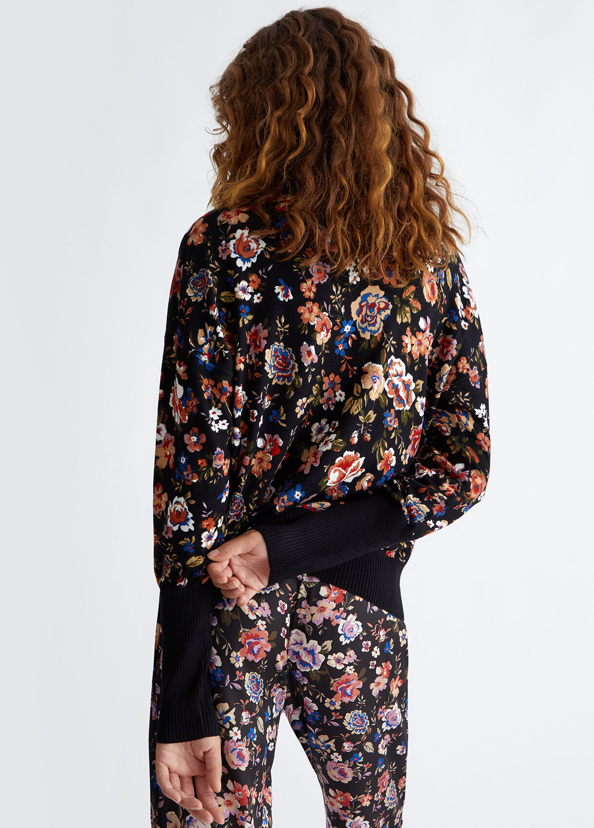 Floral sweater with logo