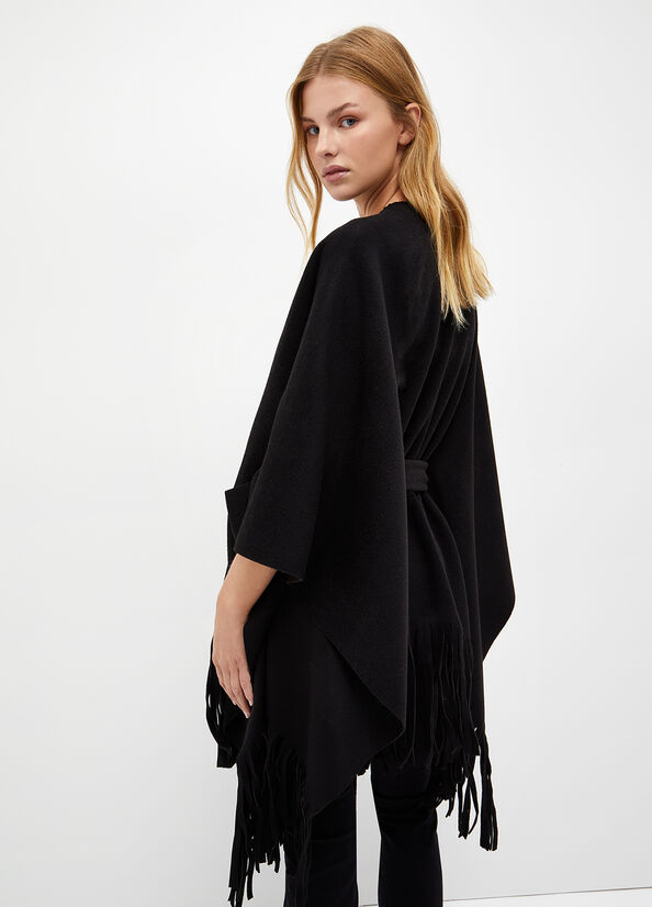 Poncho con frange e cintura