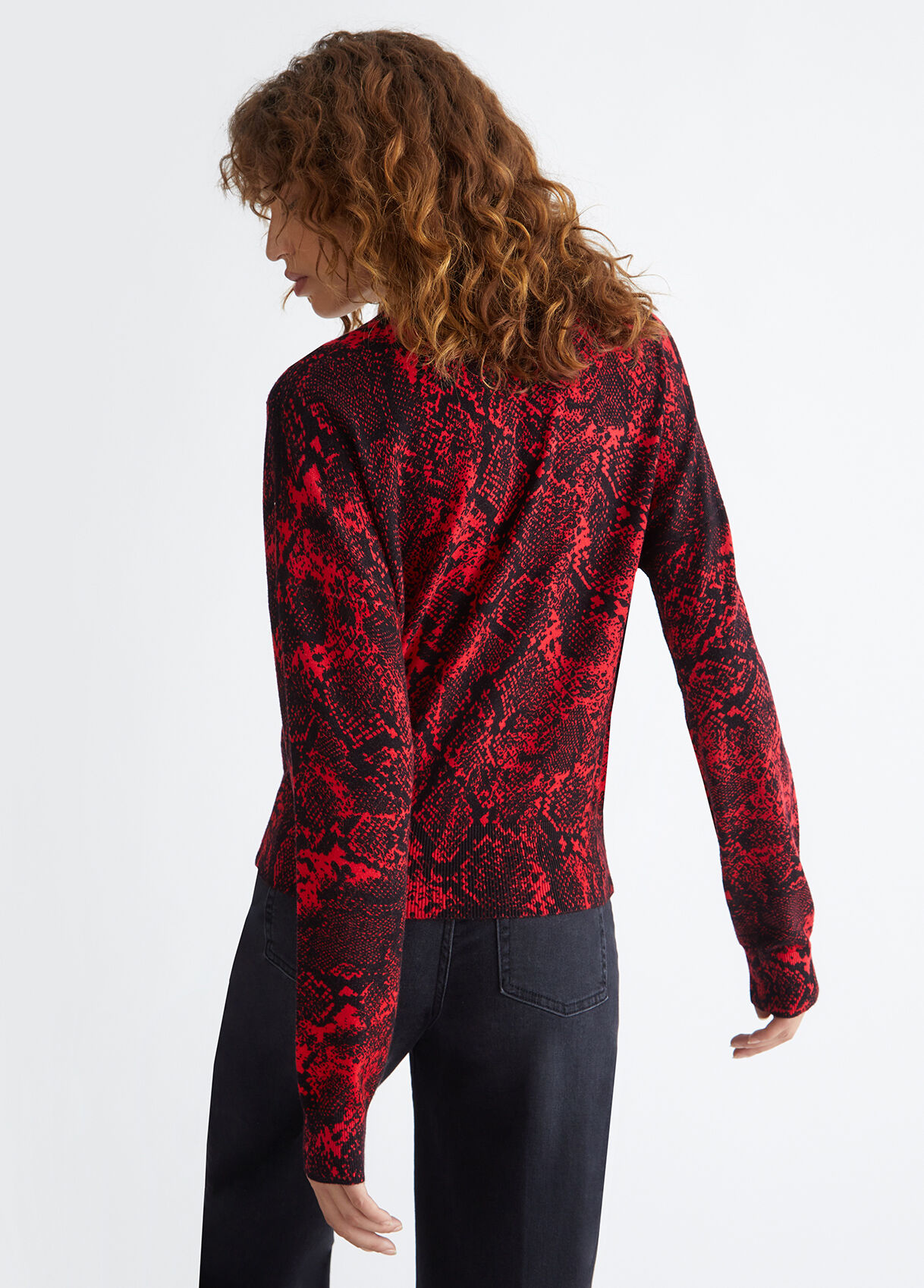 Snakeskin print sweater with hearts