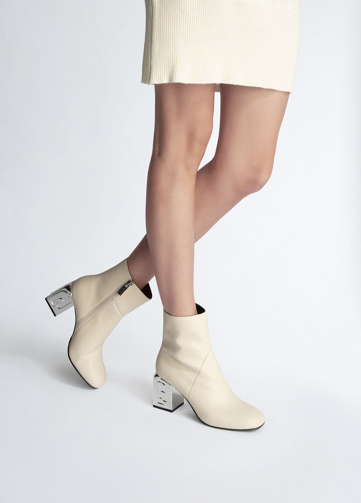 White leather ankle boots