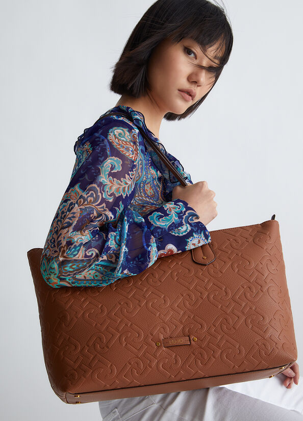 Borsa shopping in tessuto spalmato