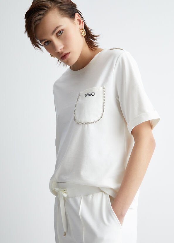T-shirt con taschino e strass