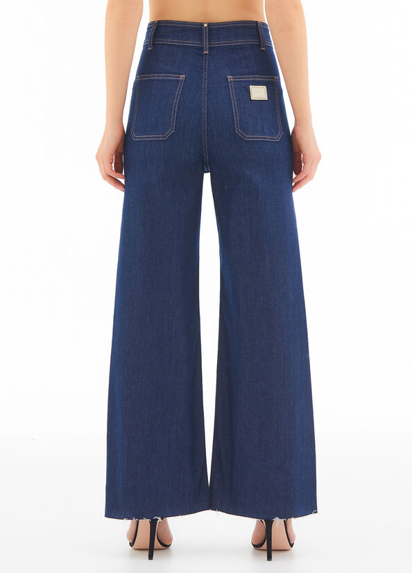 Pantalone palazzo con tasche