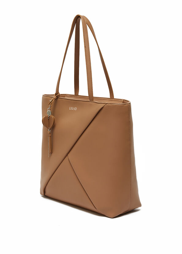 Shopping bag con charm