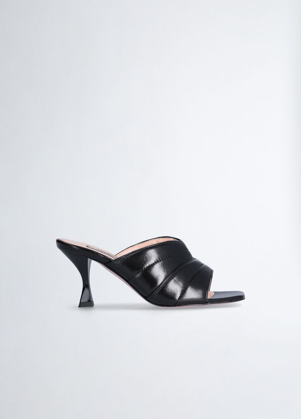 Sandali in pelle con tacco clessidra