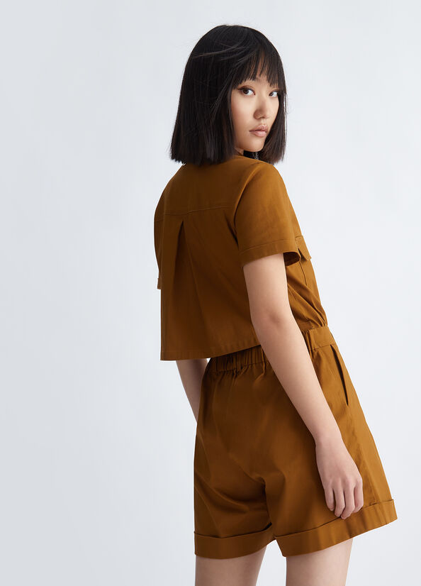 Tuta corta con cut out