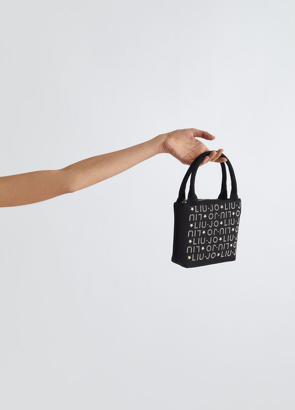 Borsa a mano con logo e borchie