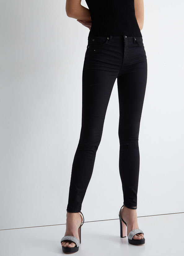 Pantaloni neri a vita alta