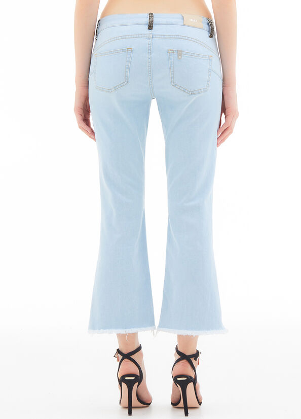 Jeans flare con glitter
