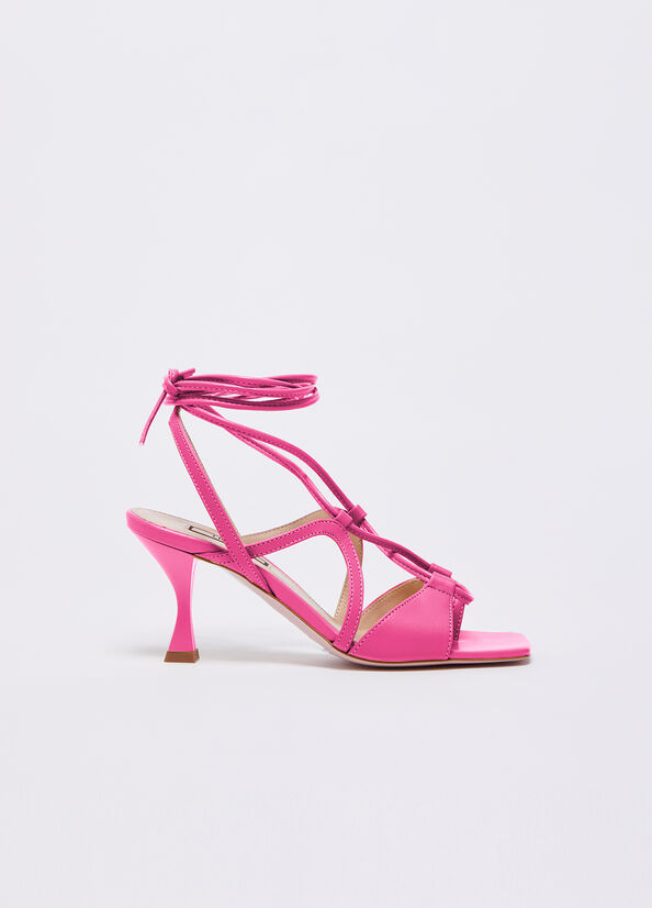 Sandali stringati con tacco basso