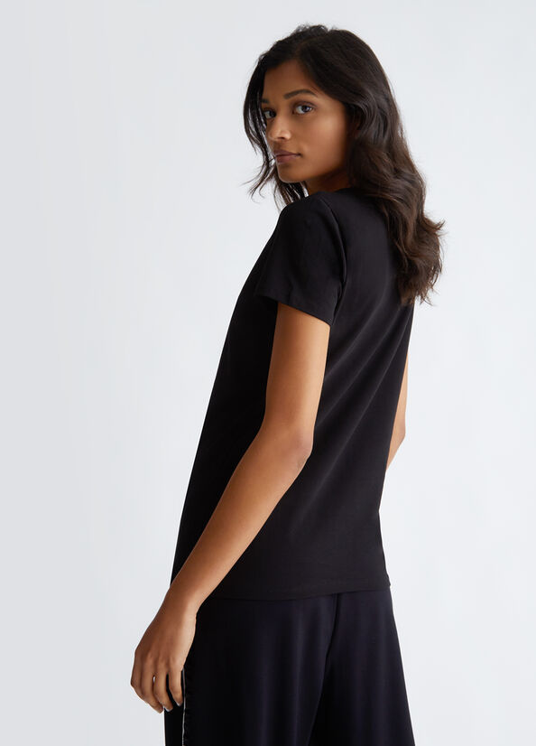 T-shirt con cuore e strass