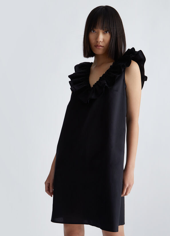 Vestito nero corto con volant