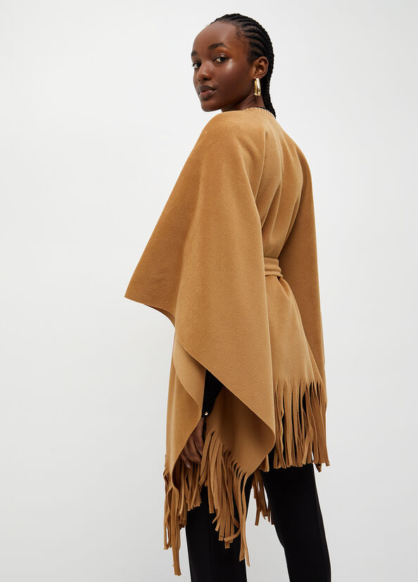 Poncho con frange e cintura