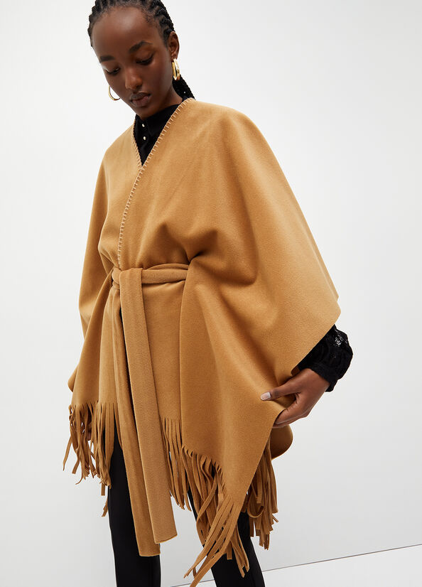 Poncho con frange e cintura