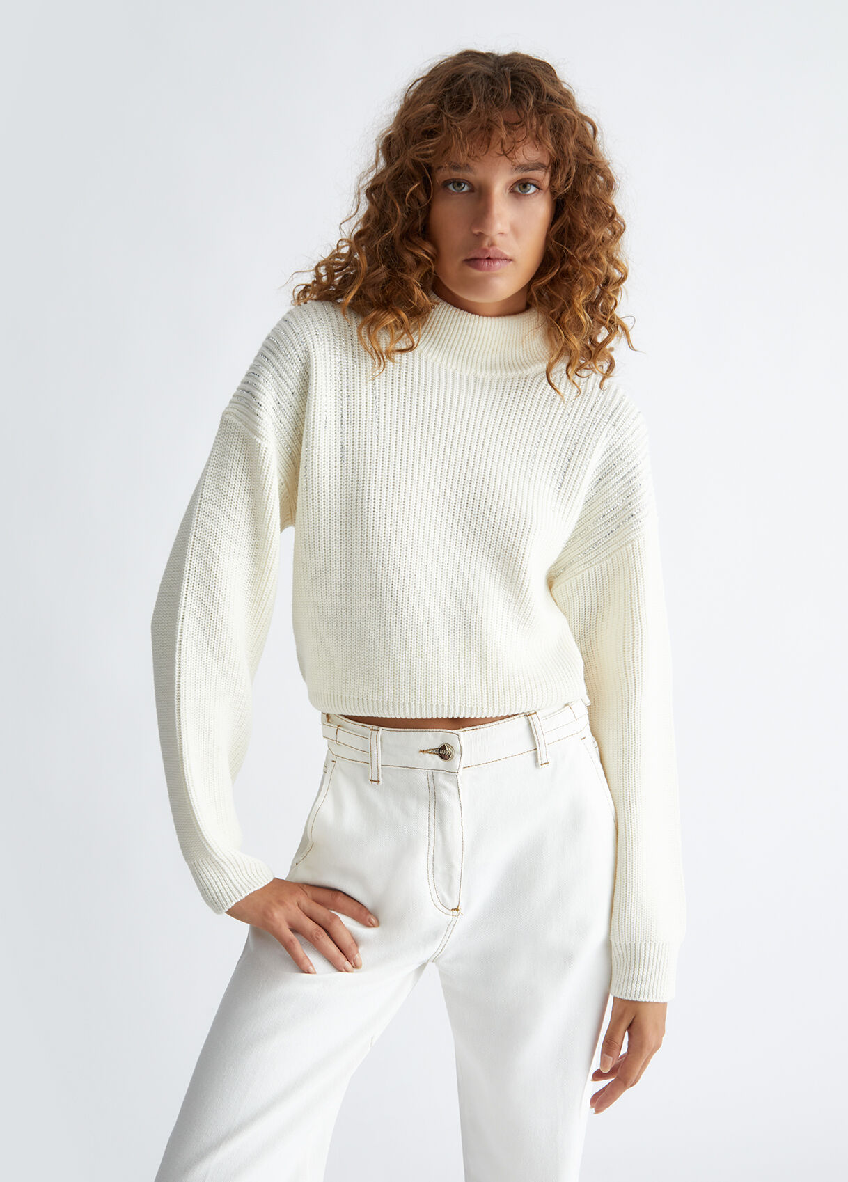 Wool turtleneck with gemstones