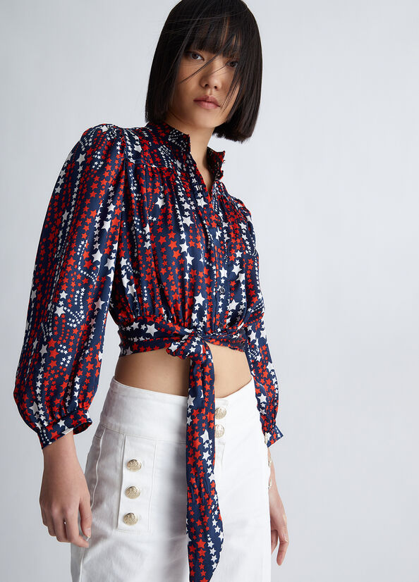 Blusa con fiocco