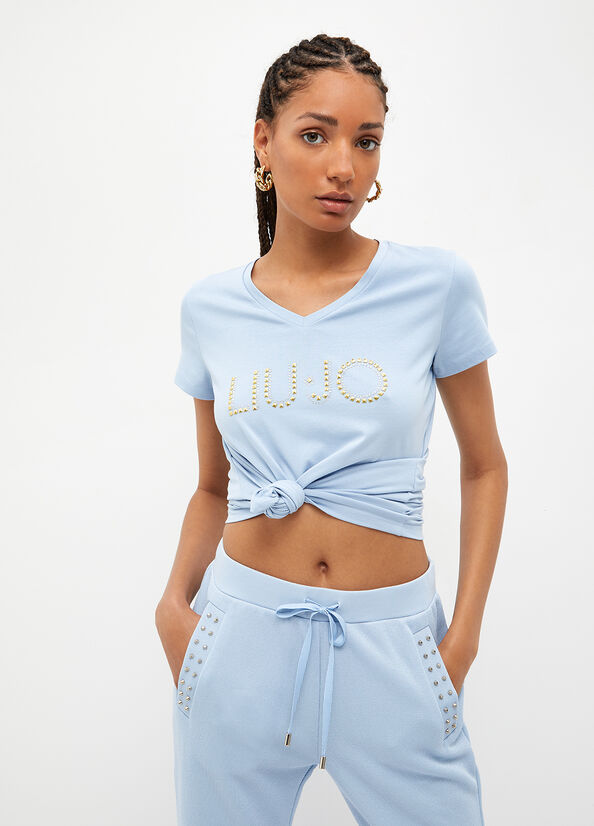 T-shirt con logo e borchie
