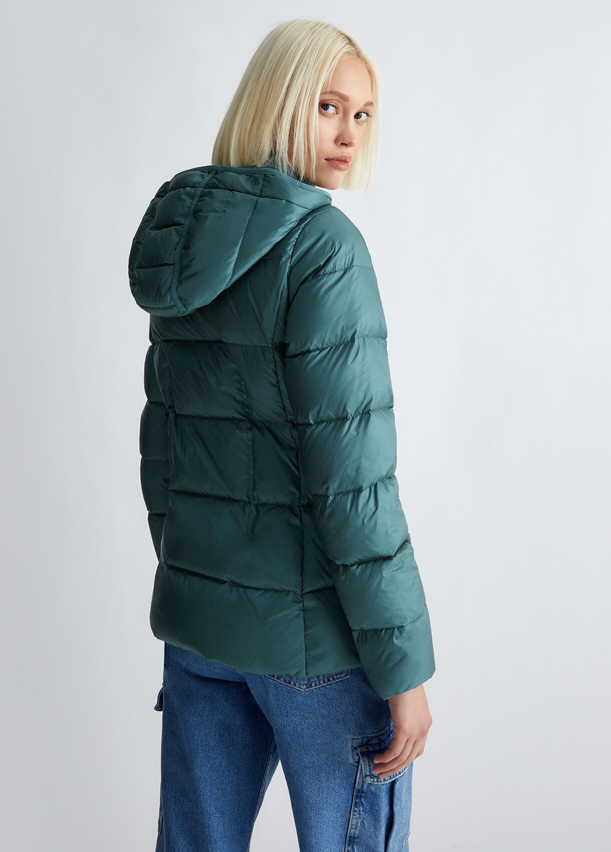 Quilted jacket with belt