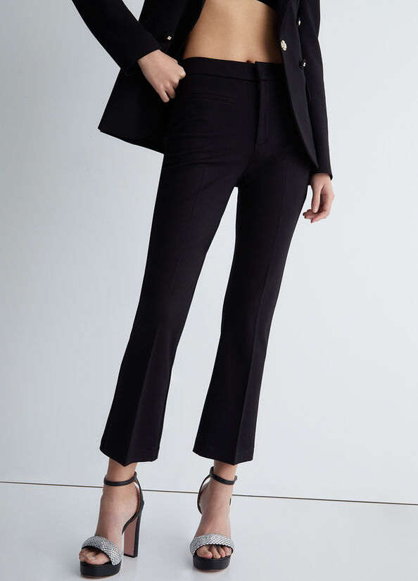 Pantaloni stretch a vita alta