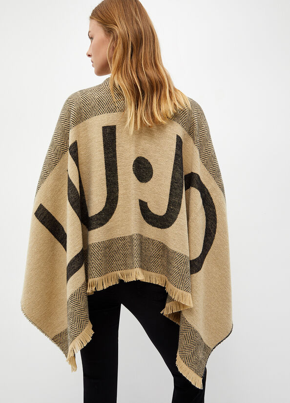 Poncho con logo jacquard