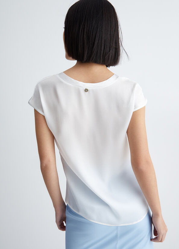 Blusa in misto seta