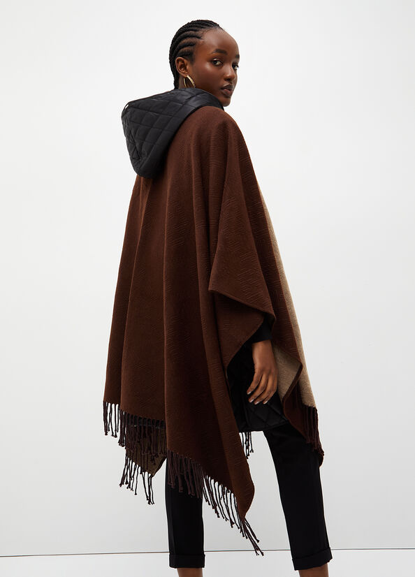 Poncho con logo e frange
