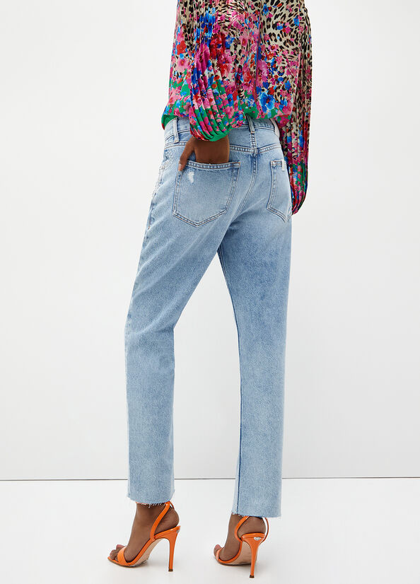 Jeans slim con applicazioni