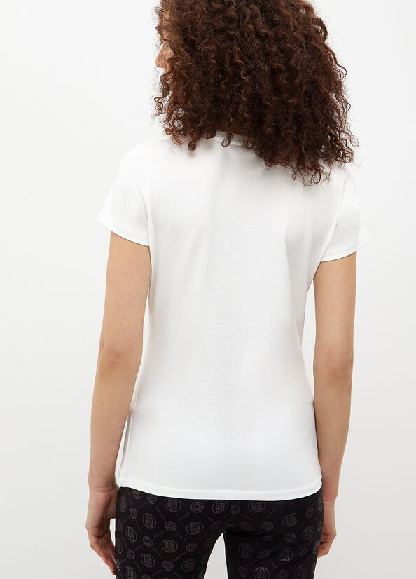 T-shirt con logo e borchie
