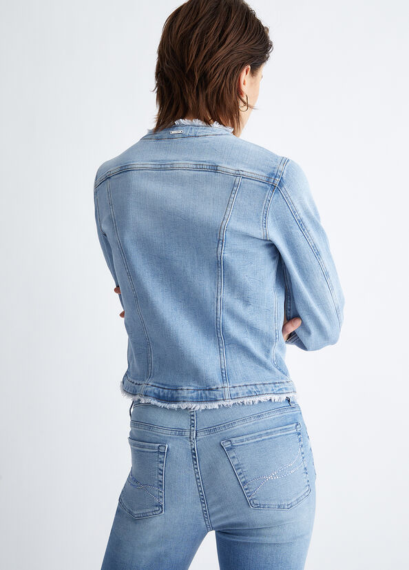 Giubbotto in denim con applicazioni