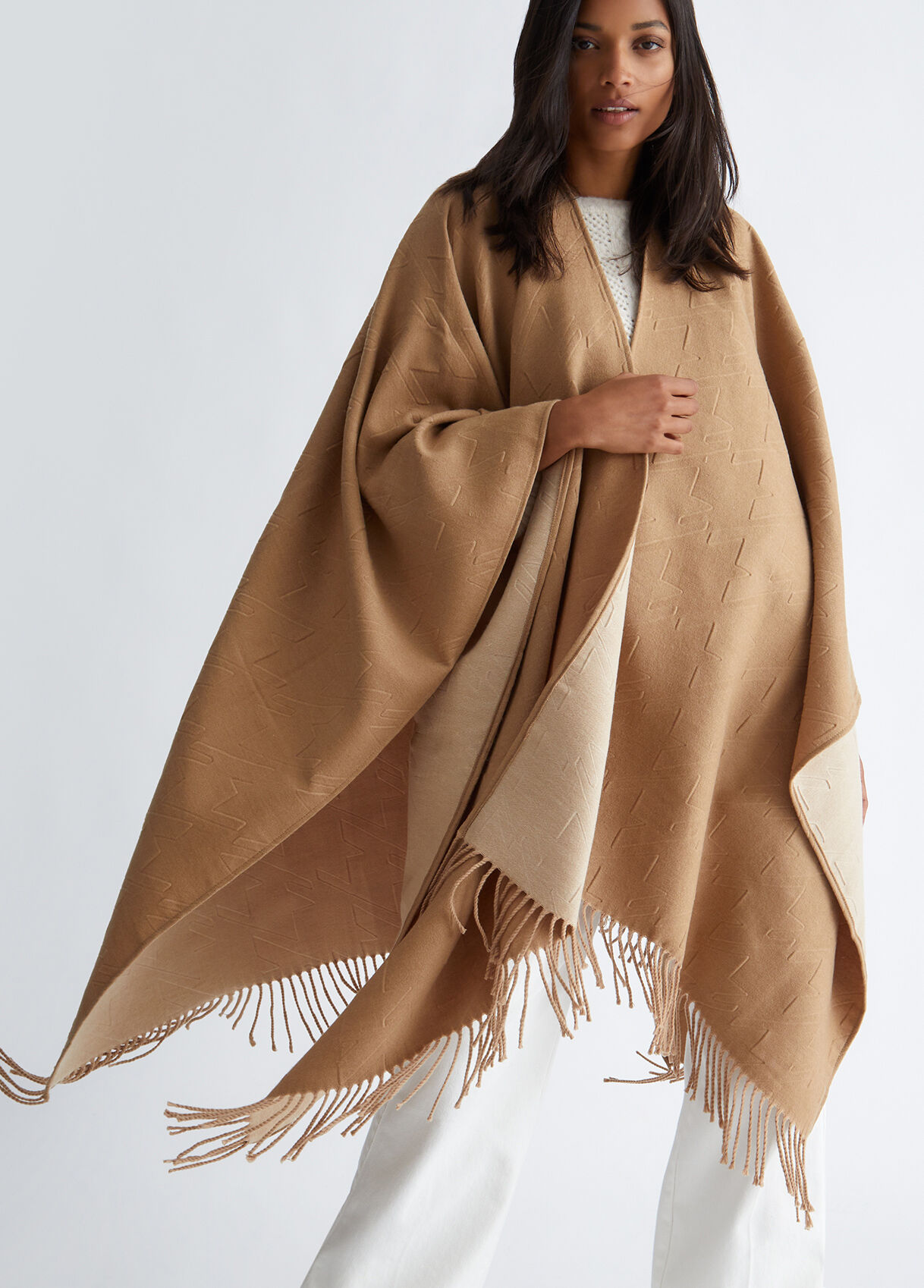 Poncho with logo