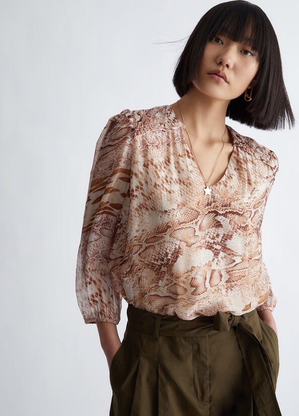 Blusa pitonata in chiffon