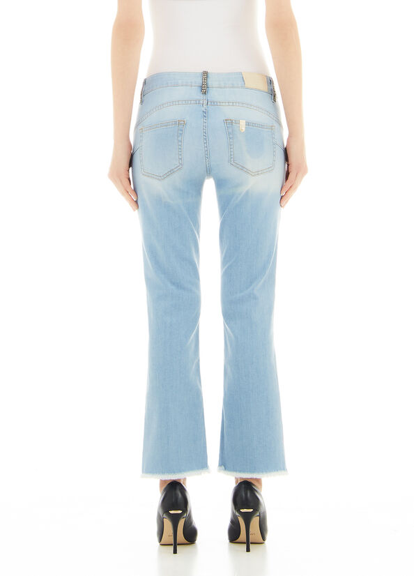 Jeans flare con glitter