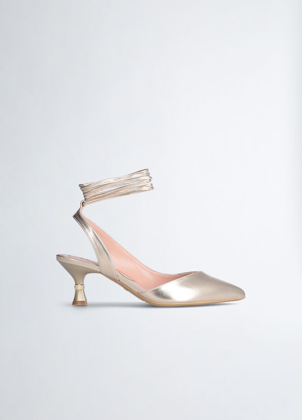 Sling back con tacco a clessidra