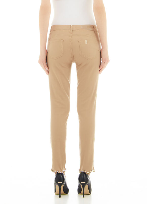 Pantalone skinny con applicazioni