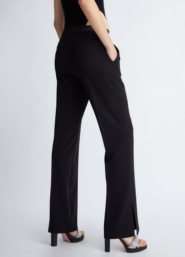 Pantaloni eleganti neri con spacchetto