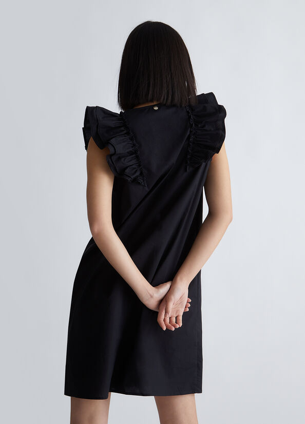 Vestito nero corto con volant
