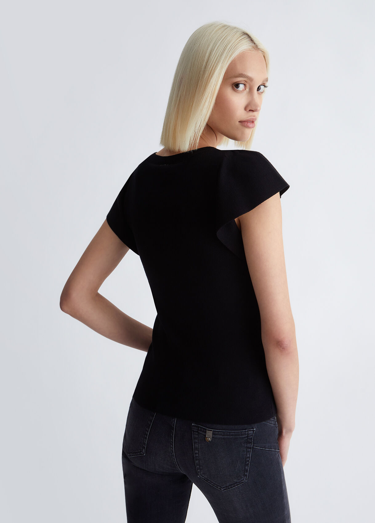 Eco-friendly top with flounces