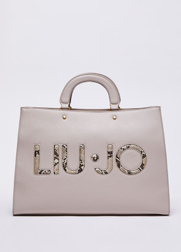 Borsa a mano pitonata