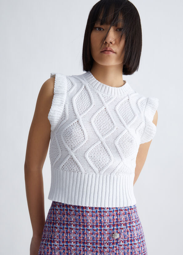 Top in maglia con volant