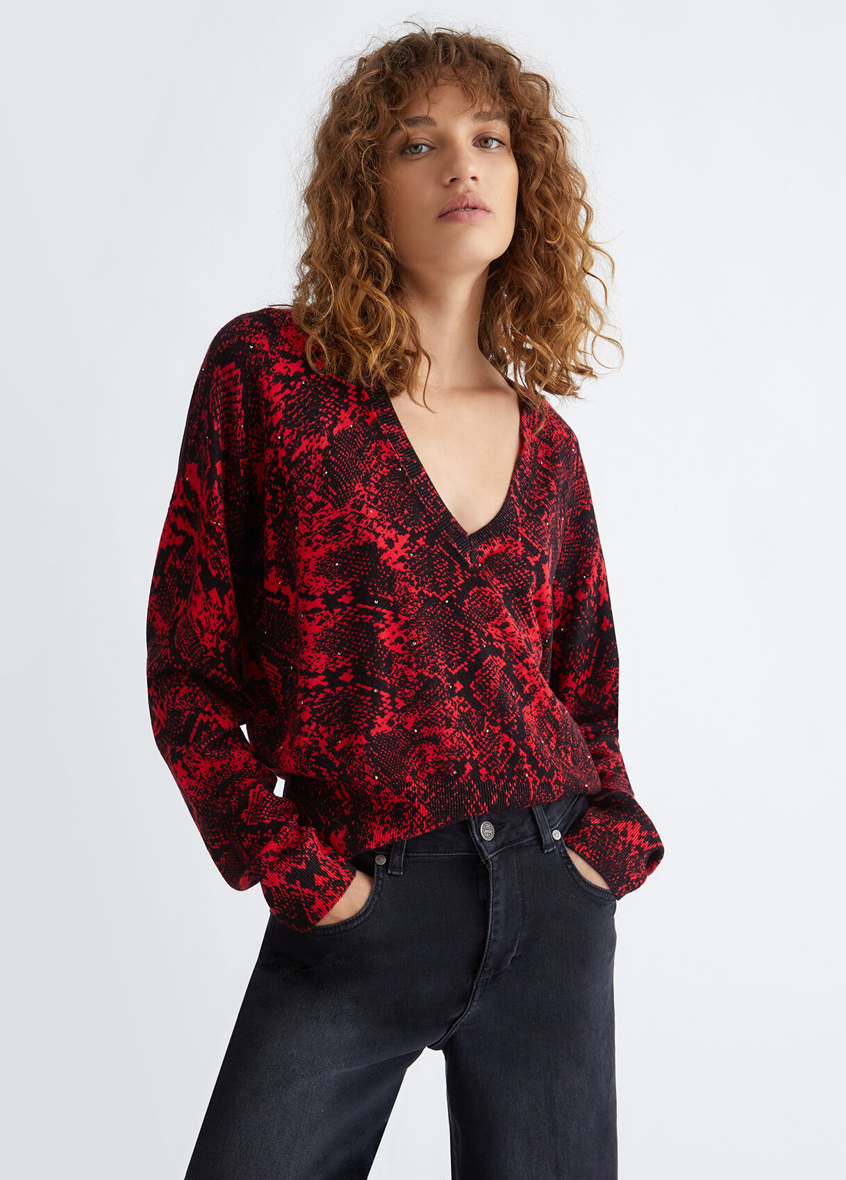 Snakeskin print sweater with hearts