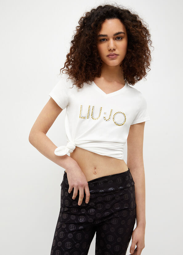 T-shirt con logo e borchie