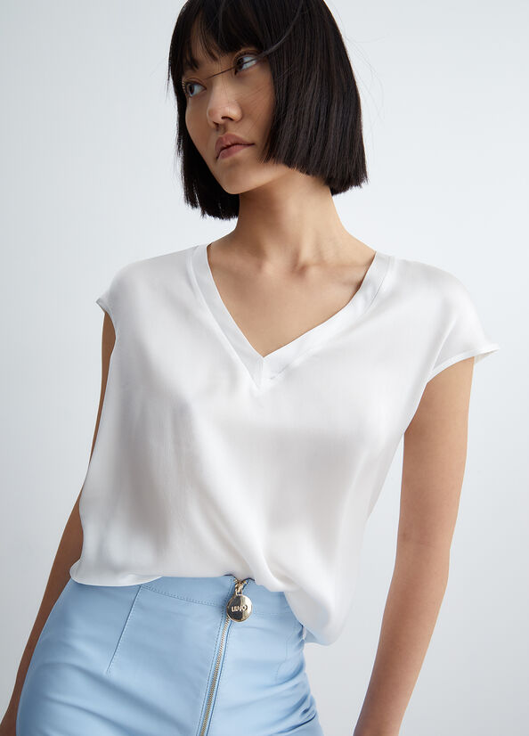 Blusa in misto seta
