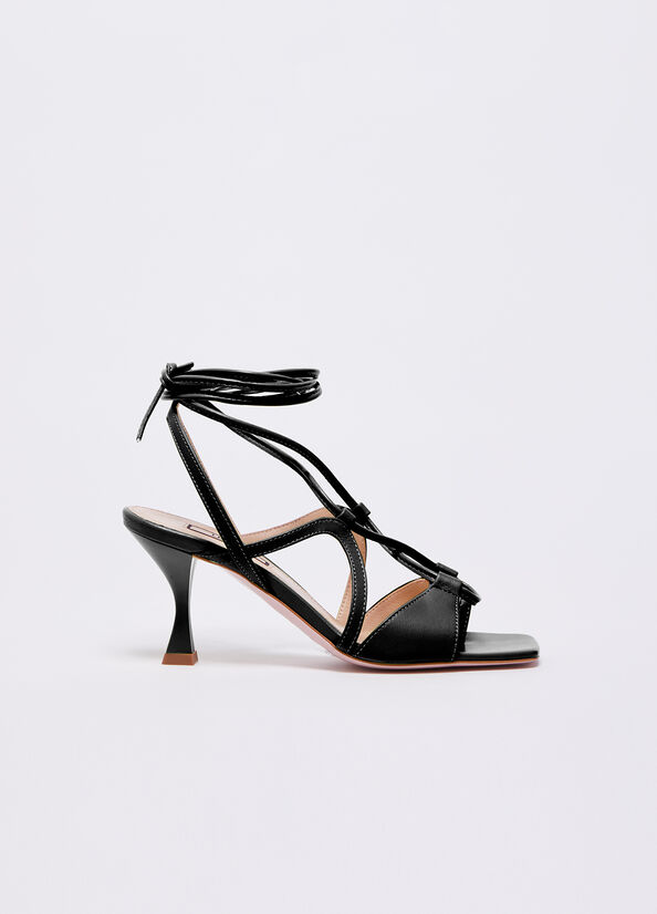 Sandali stringati con tacco basso