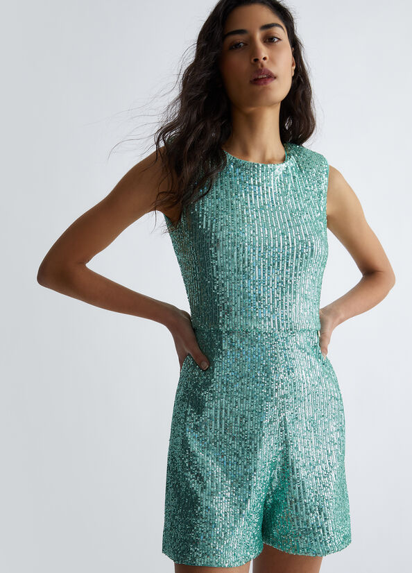 Tuta corta elegante in paillettes