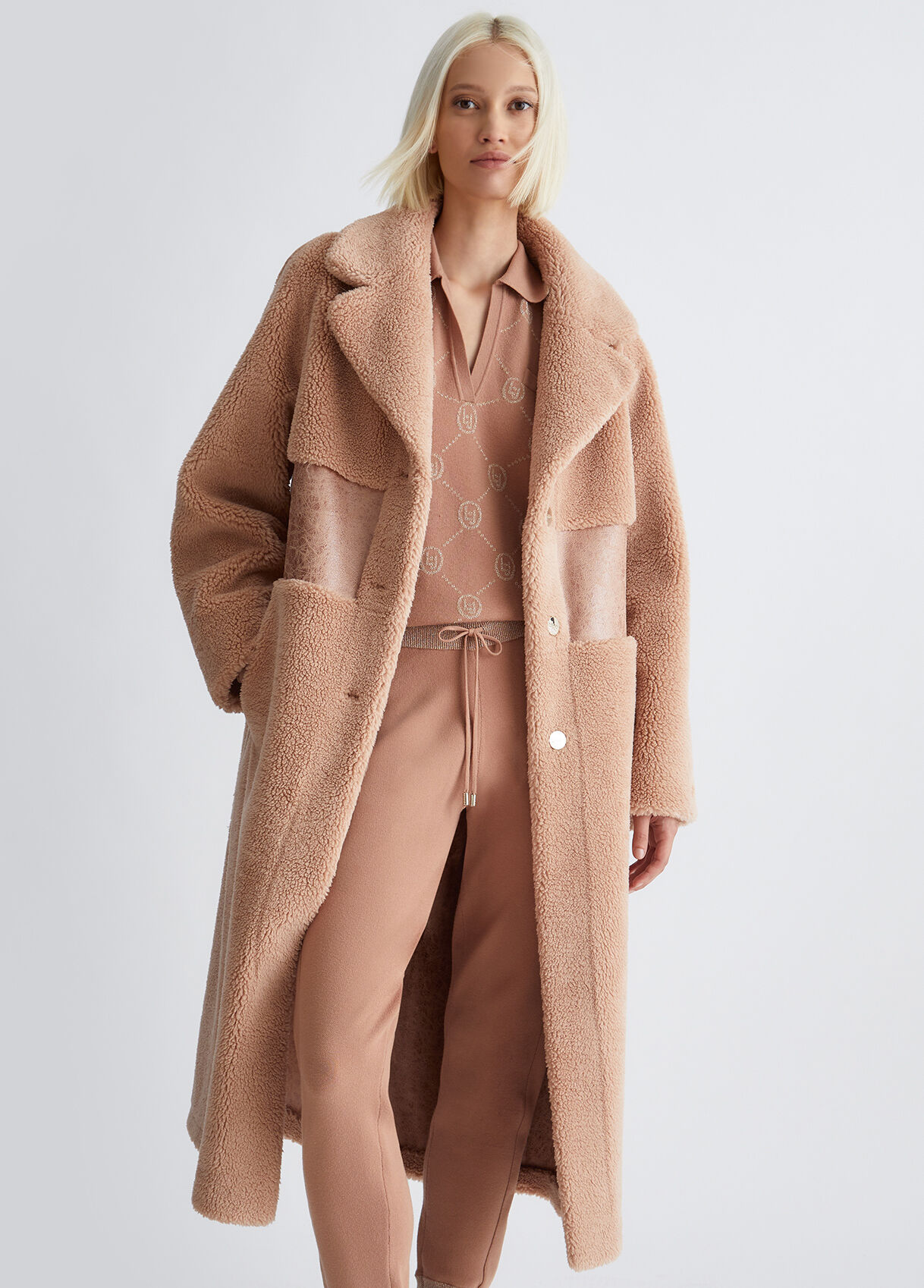 Reversible teddy and coated fabric coat